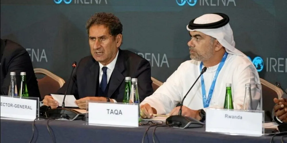 Francesco La Camera, IRENA director general (L), with Jasim Husain Thabet, TAQA CEO and UNEZA co-chair, at the IRENA summit.