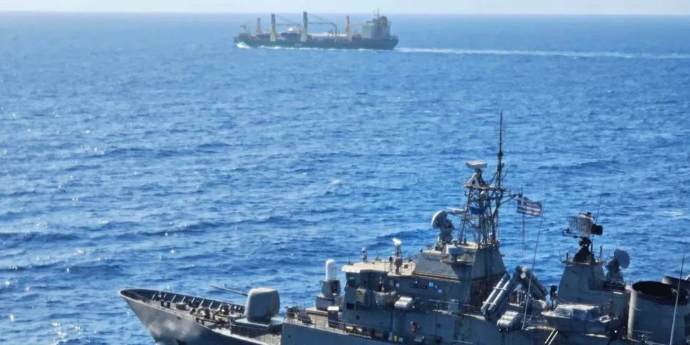 The Greek frigate Hydra is seen escorting a commercial vessel off Yemen.