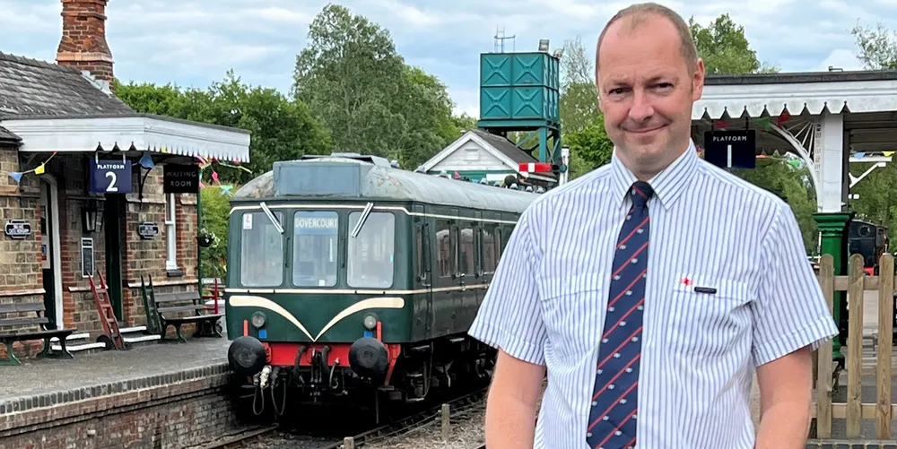 Simon Potter at play at Castle Hedingham station on the Colne Valley Railway in Essex, England, on his way to drive a former British Rail 1960-built diesel train.