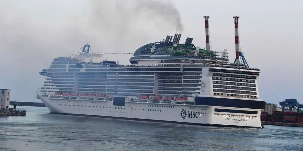 Exhaust billows from the cruiseship MSC Grandiosa as it leaves the port of Genoa in August after six-and-half months of inactivity due to the coronavirus pandemic.