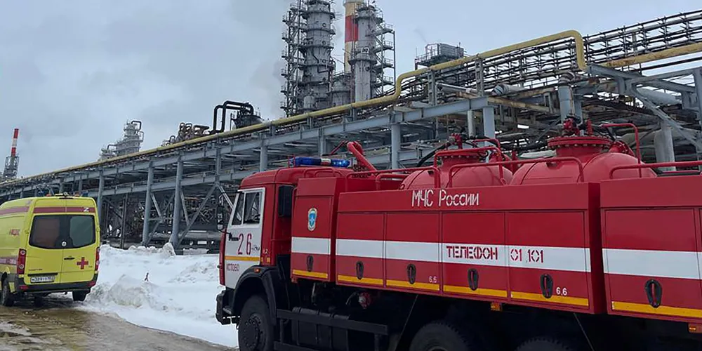 Emergency vehicles at the spot of a fire on the grounds of a fuel and energy complex in the town of Kstovo, about 450 km (280 miles) east of Moscow, following a drone attack.