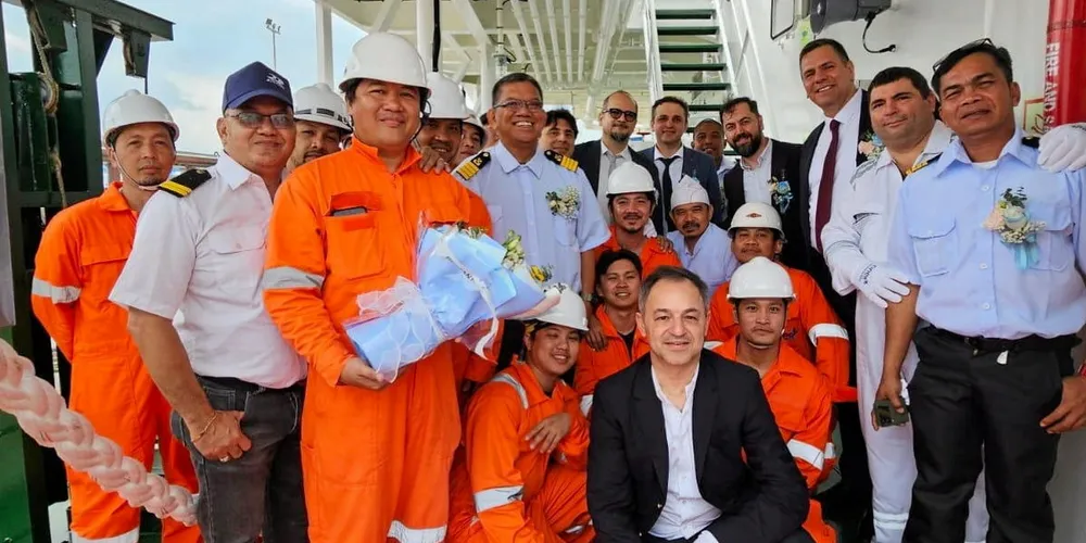 Ciner Shipping chief executive Vasileios Papakalodoukas (front row, crouching) with the crew of the company’s recently delivered 40,500-dwt Eastbourne (built 2024).