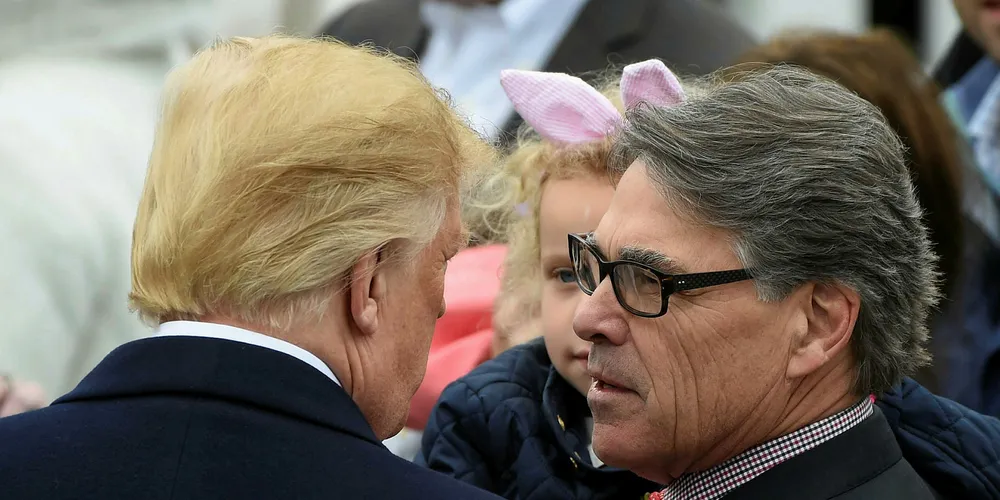 US President Donald Trump speaks with his energy secretary, Rick Perry, earlier this year.
