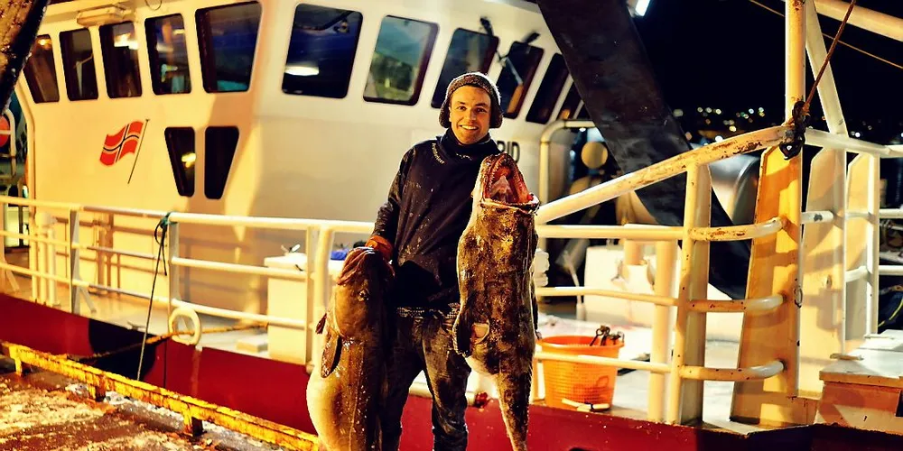 SMILER: Christian Eirik Aanonsen kan smile etter dagens fangst. Delta med bilder på #fiskersexy du også.