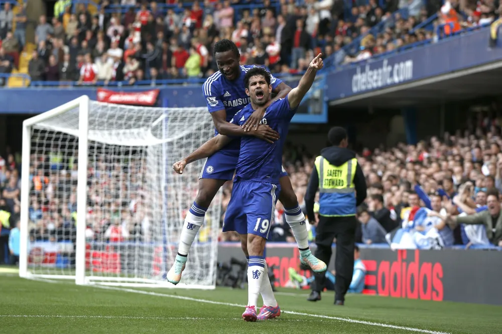 Netting a second: Chelsea's prolific Spanish striker Diego Costa celebrates another winning goal with team-mate John Obi Mikel