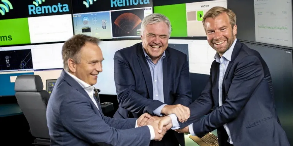 From left: Ostensjo’s Havard Framnes, DeepOcean CEO Oyvind Mikaelsen and Kjetil Ramstad, finance chief of Solstad Offshore, agree the deal.