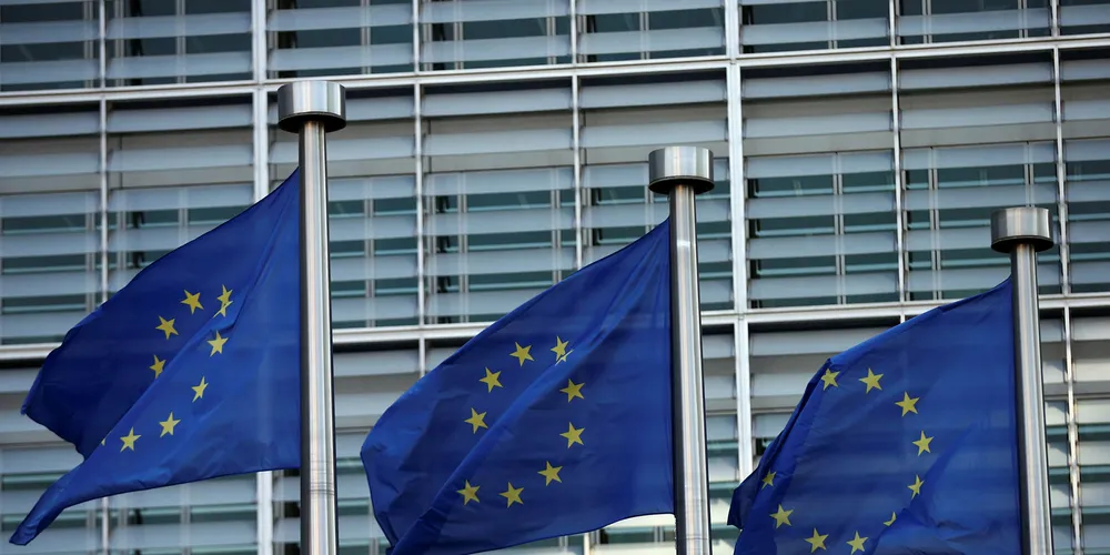 EU flags fly outside the European Commission headquarters building