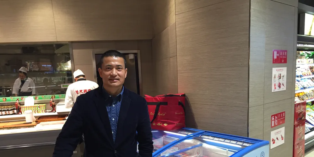 Jerry Chang of Chang International, with a Ocean Gala point of sale freezer.
