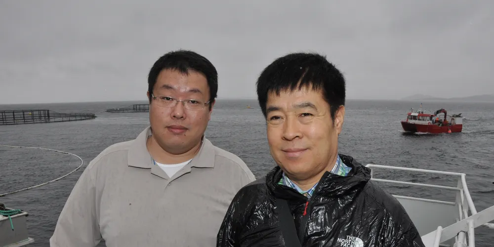 Baichun Zhang (right) with son Lei Zhang of Fish Track