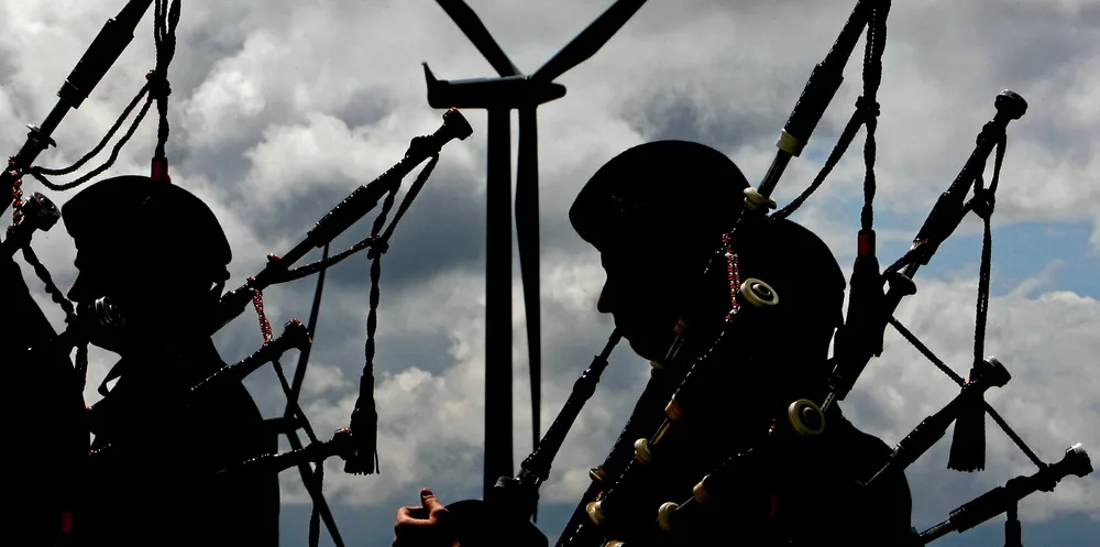 Pipers play at Iberdrola's Whitelee windfarm.