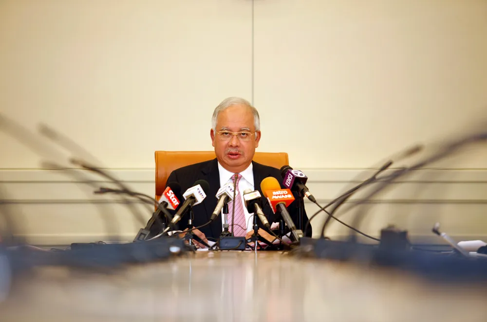 Najib in the hot seat: Malaysian Prime Minister fends off claims the country has ceded two blocks to Brunei