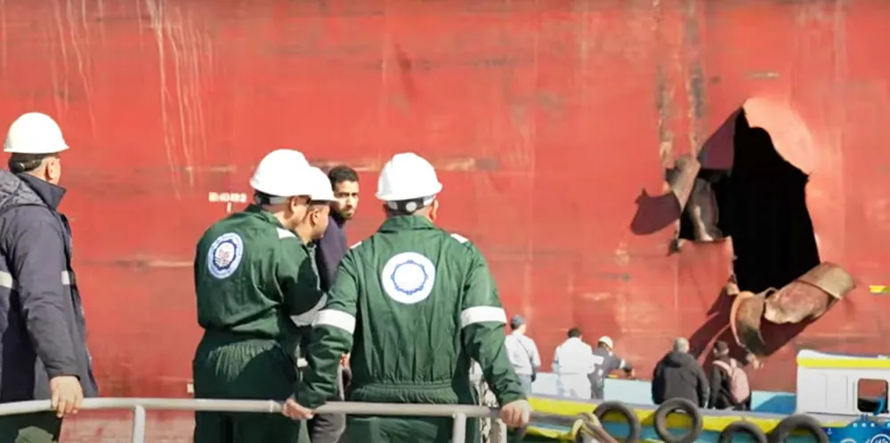 Missile damage is visible on the hull of the 56,900-dwt Zografia (built 2010), which is under repair in the Suez Canal.