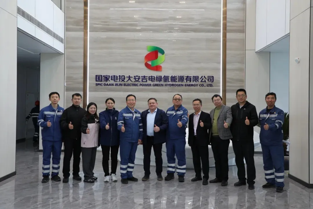 Representatives of Jilin Electric Power and Bureau Veritas at the Chinese utility company.
