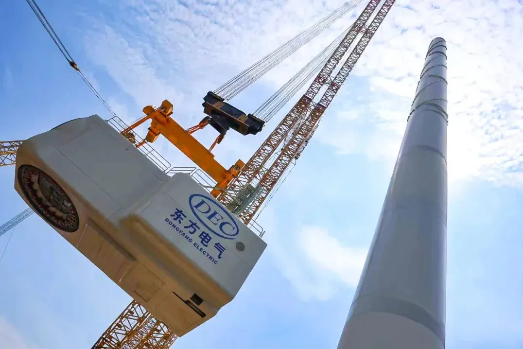 The nacelle for the 26MW wind turbine being hoisted during installation.