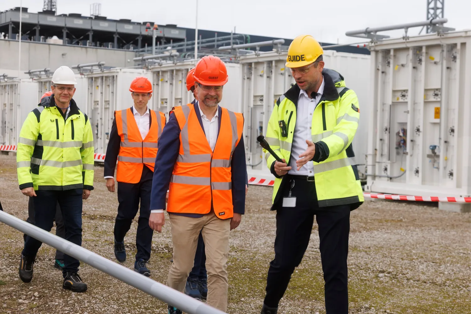 Danish finance minister Nicolai Wammen, front left, being shown around the project site by Everfuel CEO Jacob Krogsgaard yesterday.