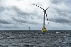 Stiesdal Offshore Technologies' TetraSpar prototype (foreground) with Hywind Demo R&D unit, at MetCentre testing site in Norwegian North Sea